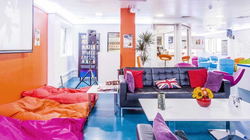 The colorful lobby at the gay friendly SoHostel London, great for budget travelers.