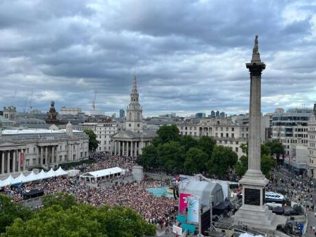 Aerial view of Trafalgar Square during Pride, the crowd is filling up the whole square.