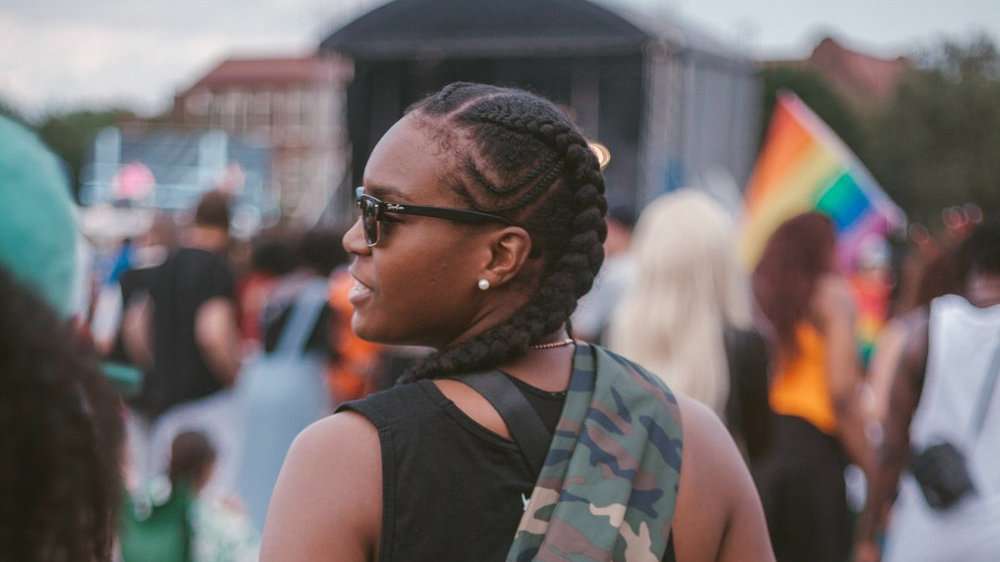 Woman of color, celebrating UK Black Pride, a gay event for queer black people in London.