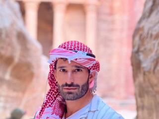 Stefan from Nomadic Boys wearing a kaffiyeh Arabic headscarf.