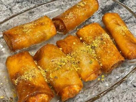 Kollaj are crispy rolled up pastries popular across the Middle East.