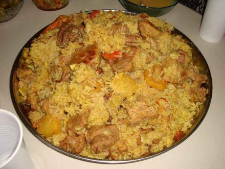 Maqluba is a big bowl of rice with meat and vegetables.