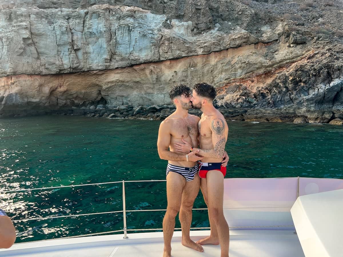 Gay couple kiss with Addicted ES speedos.