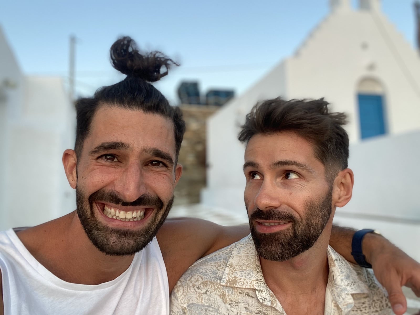 Stefan from Nomadic Boys wearing a beautiful man bun and Seby not being impressed.