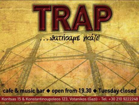 The Trap bar logo on a brown background with address and opening hours.