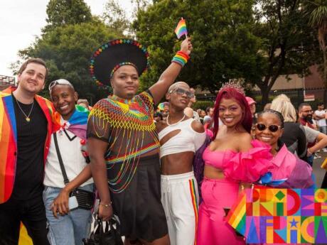 A proud group of queers posing for a photo at Johannesburg Pride.