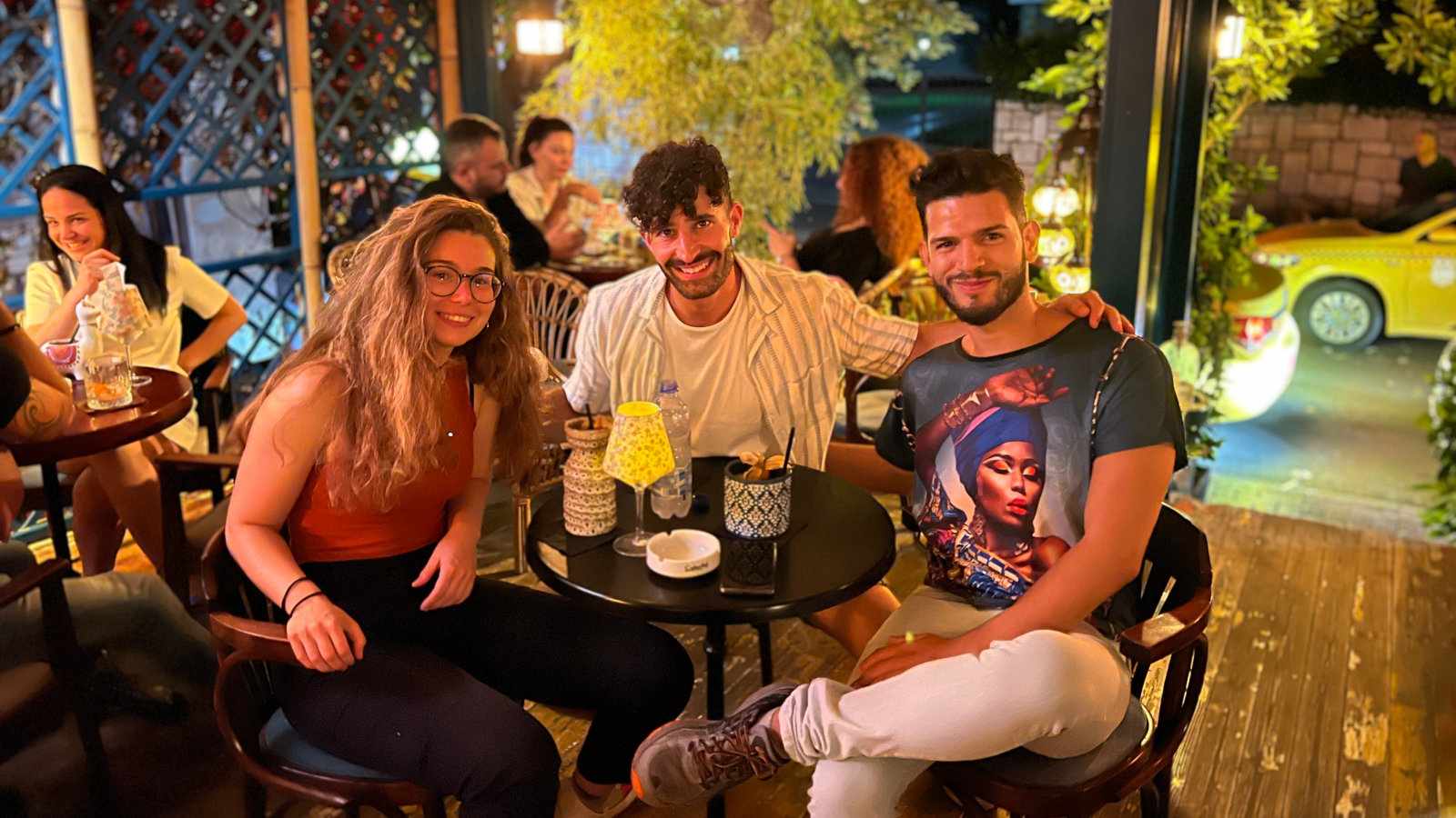 A group of friends having a drink in a gay friendly bar in Tirana Albania.