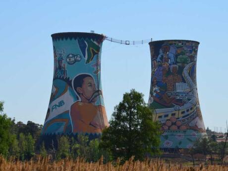 Old silos transformed with street art and used for bungee jumping at the Soweto Township in Johannesburg.