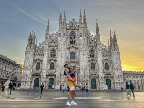 Stefan and Sebastien romantic sunrise moment in front of the Milan Il Duomo Cathedral.