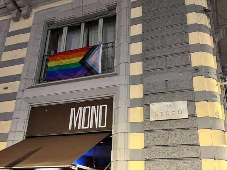 The entrance to MONO gay bar in Milan, proudly flying a rainbow flag.