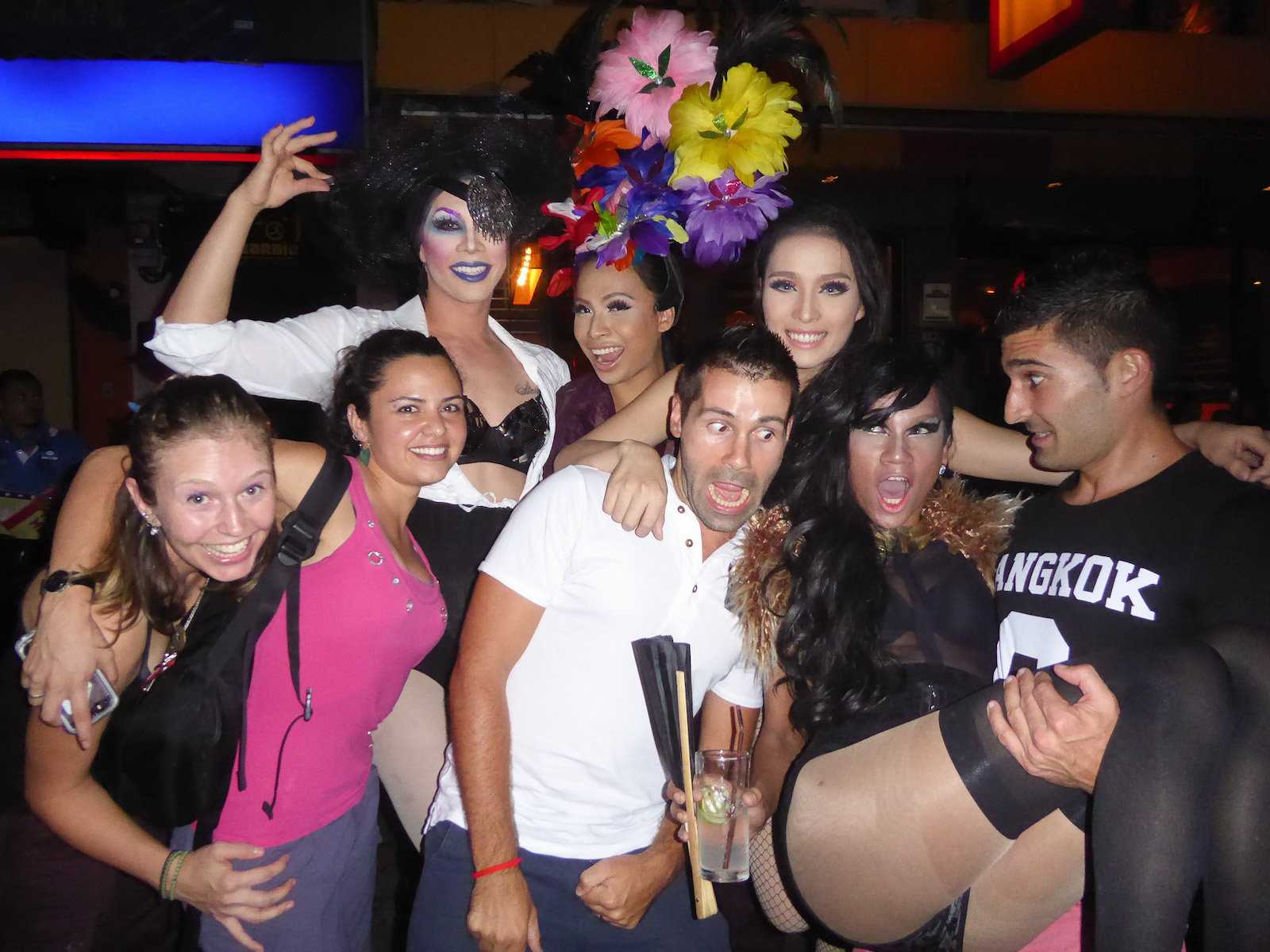 Seby and Stefan posing with silly faces with a group of ladies in Bangkok.