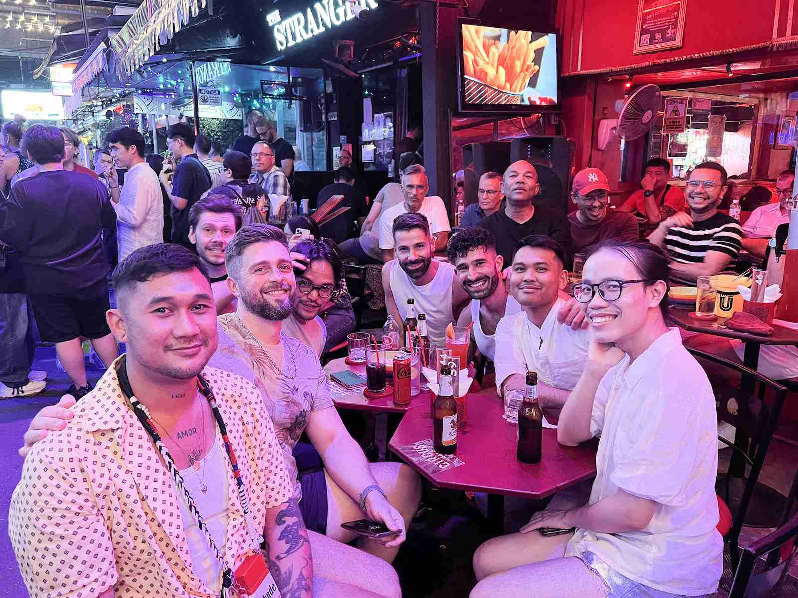 Seby and Stefan with group of gay friends at Circus gay bar in the Silom gay neighborhood of Bangkok.