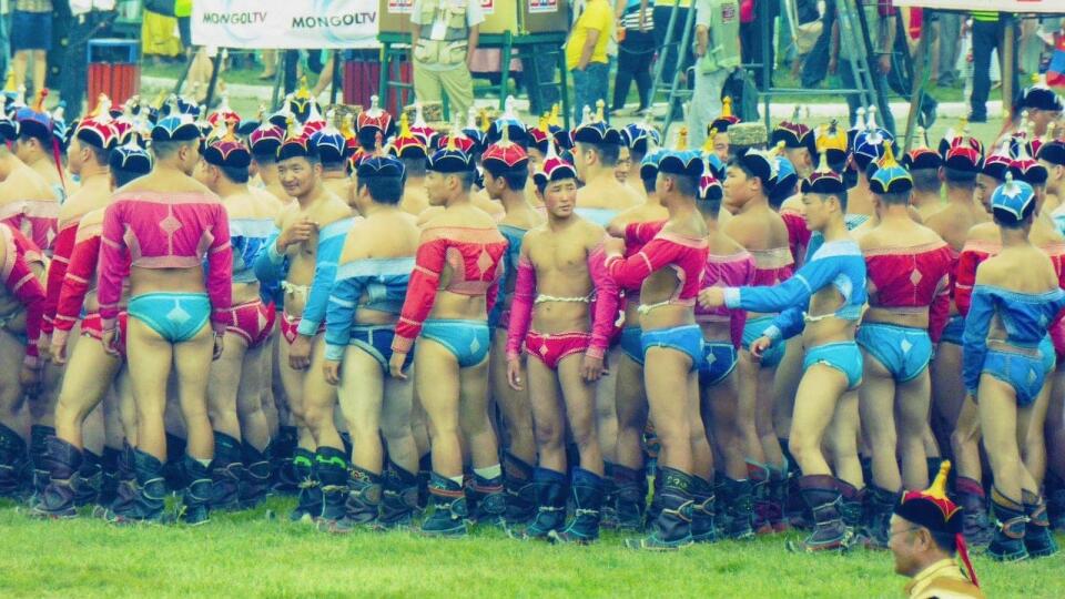Wrestlers at Naadam Festival lining up at the Opening Ceremony.