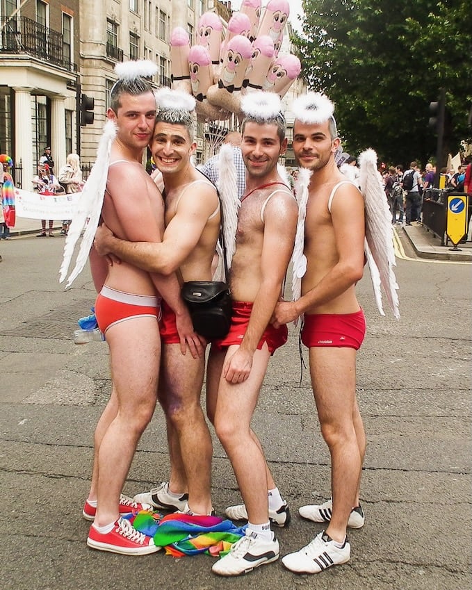 Posing at London Pride in our red aussiebums with our friends.