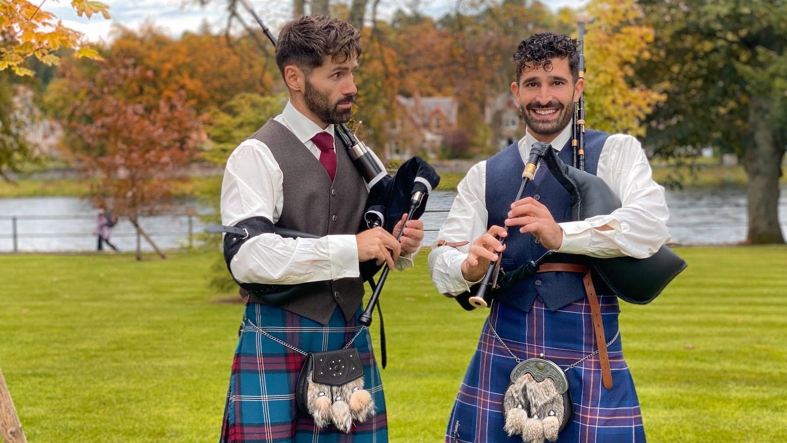 Learning to play bagpipes in our kilts in Inverness, Scotland.