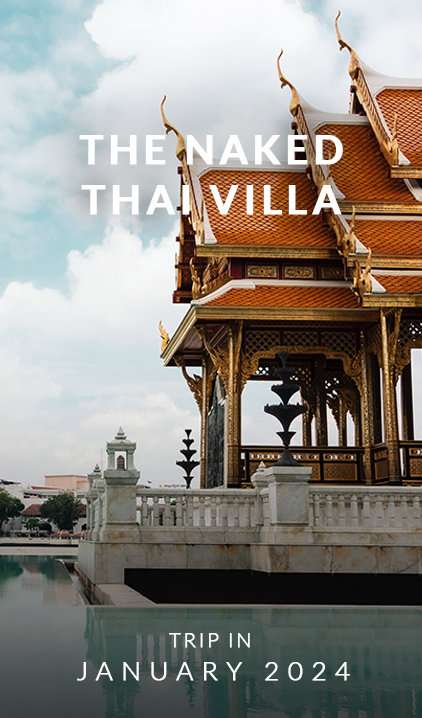 A traditional Thai temple with text overwritten than says "The Naked Thai Villa Trip in January 2024."