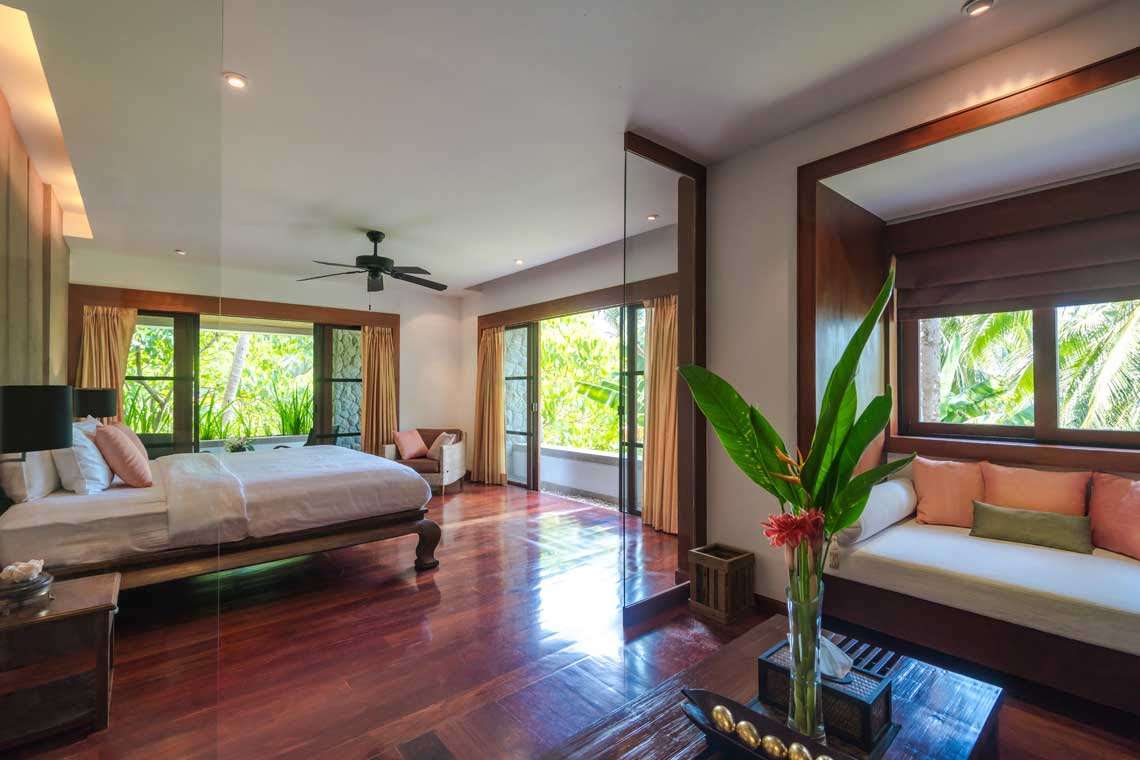 A luxurious and airy room at the Naked Thai Villa in Phuket.