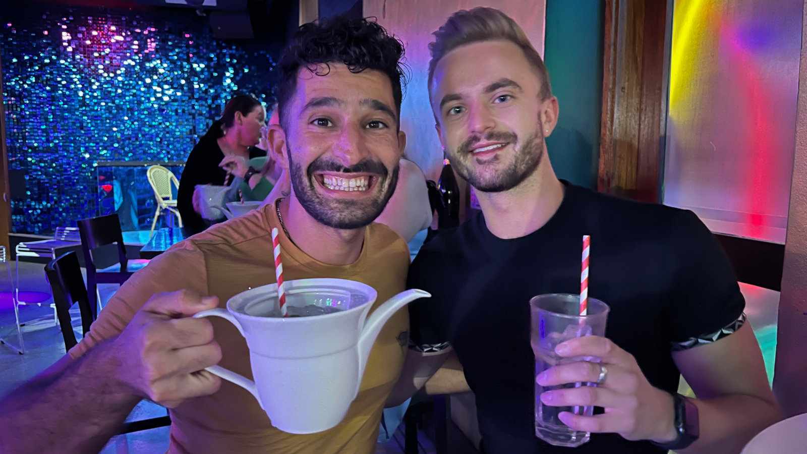 Stefan and Adam at Oxford gay bar in Sydney with a teapot of Margarita.