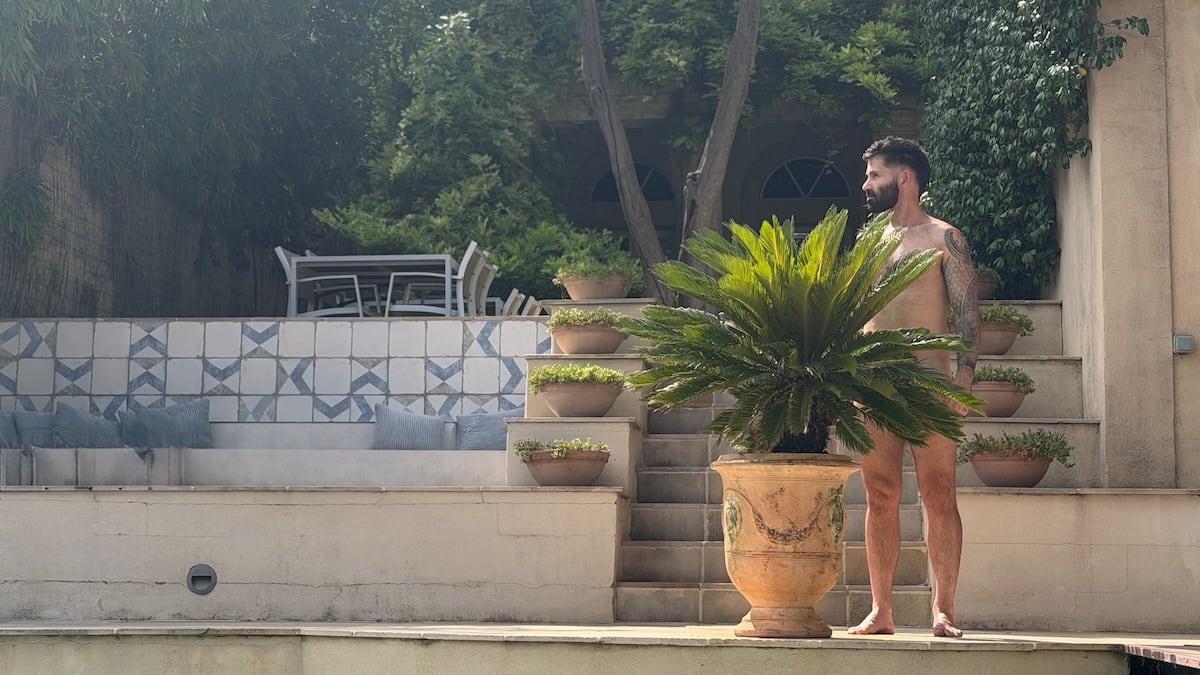Seby naked next to plant in French villa.