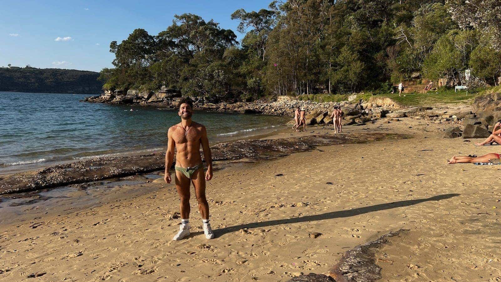 Stefan in Speedos at the Cobblers Nudist gay beach in Sydney.