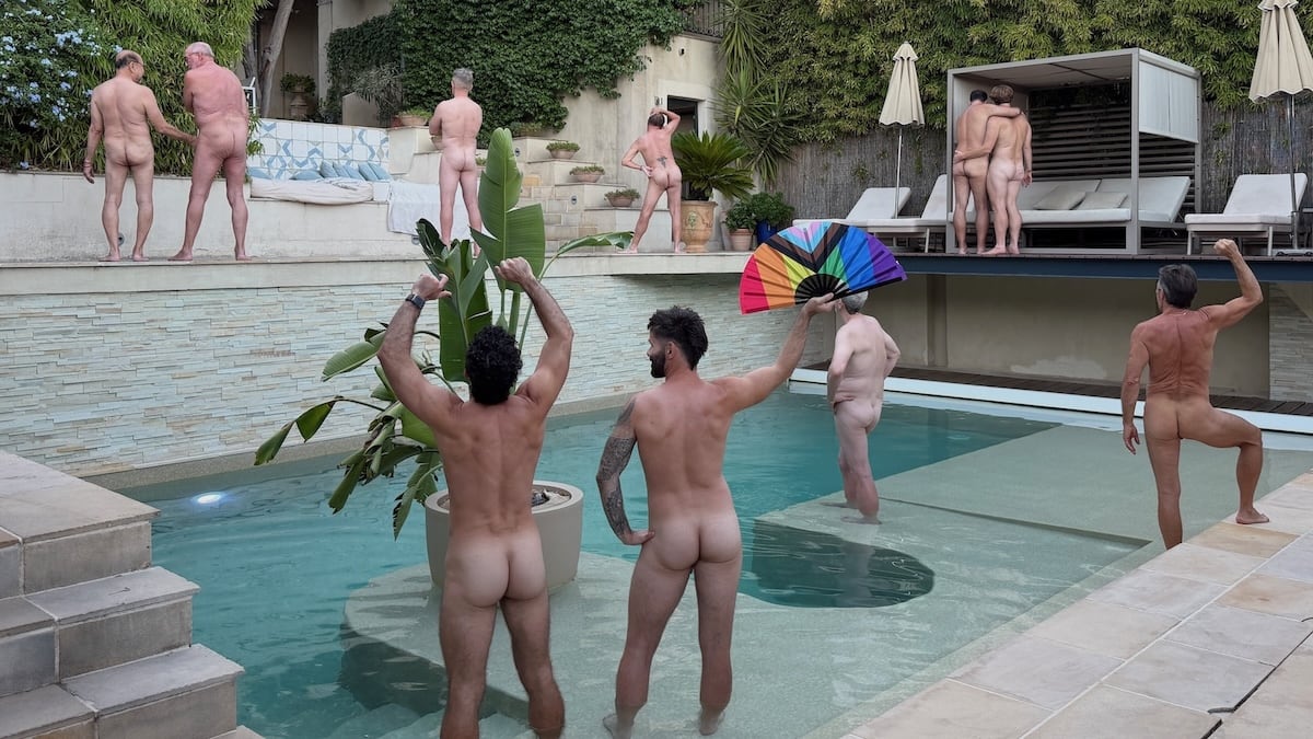The Naked French Experience and Nomadic Boys posing by the pool.