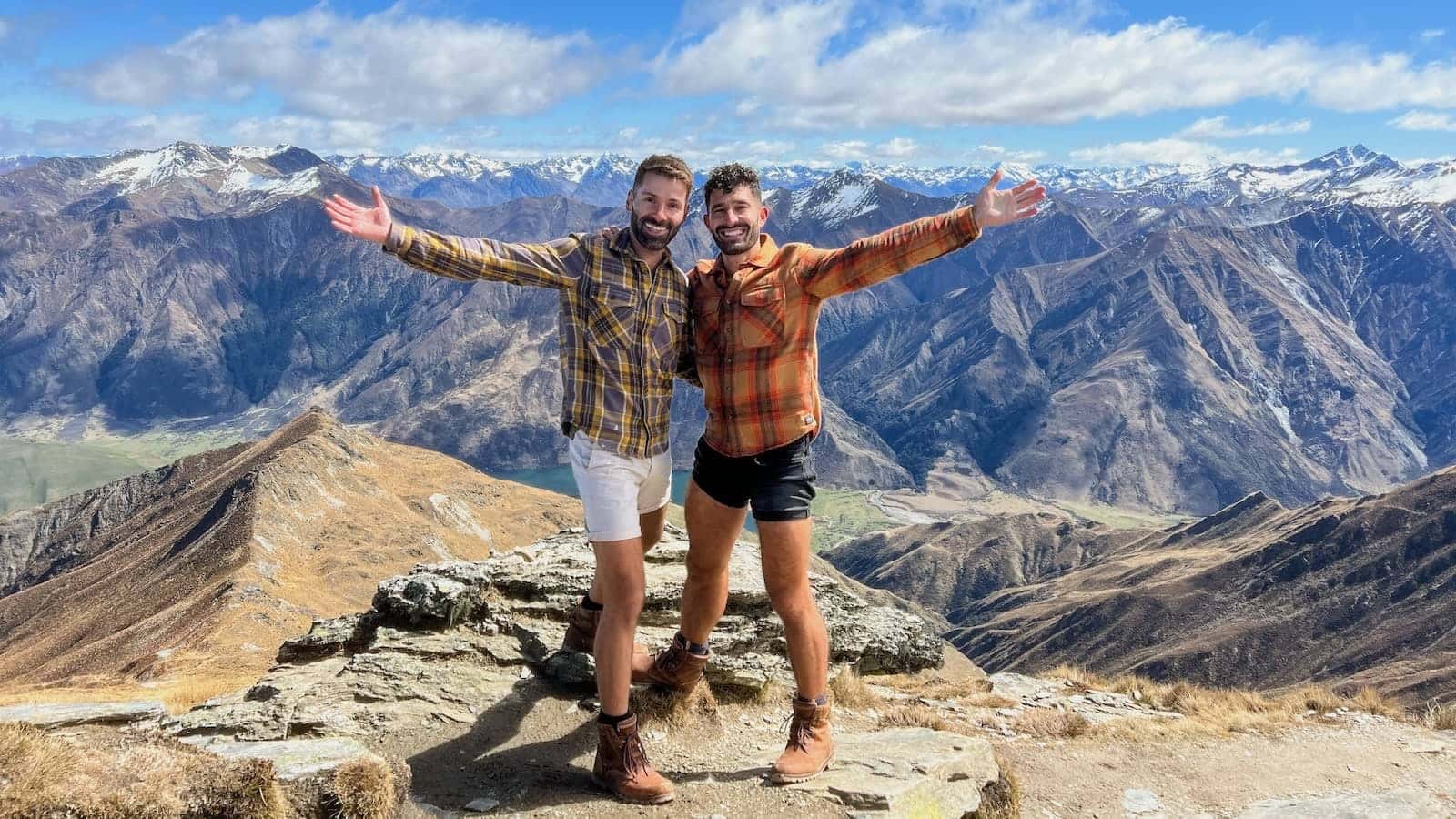 Gay couple on Ben Lomond trek in South Island in New Zealand.