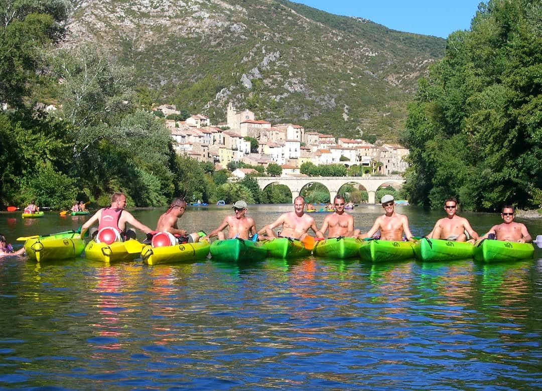 Gay men kayaking in South France.