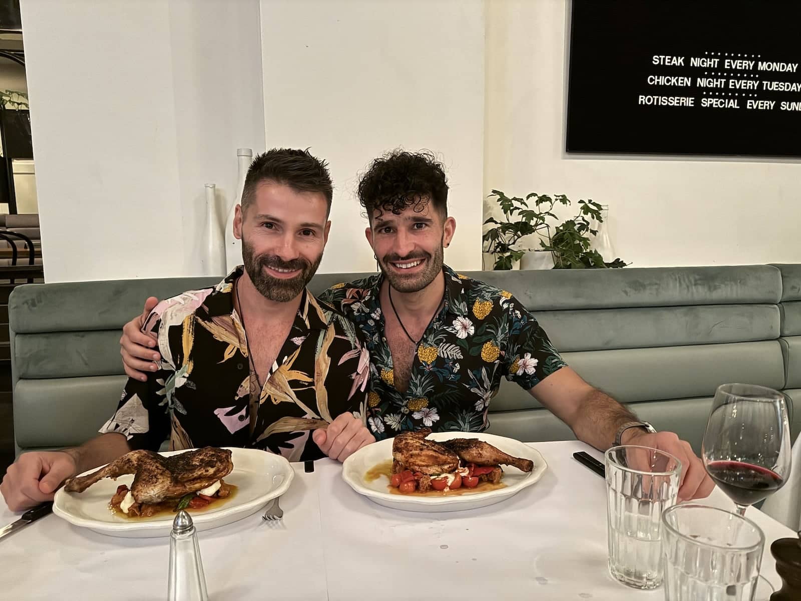 Gay couple eating dinner at the Builders Arms restaurant in Melbourne.