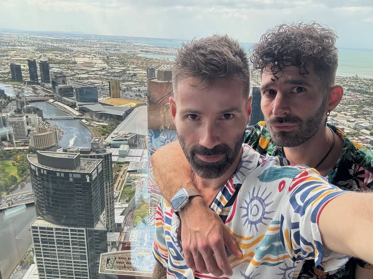 Cute gay couple selfie at the viewing platform of the Eureka Skydeck in Melbourne.