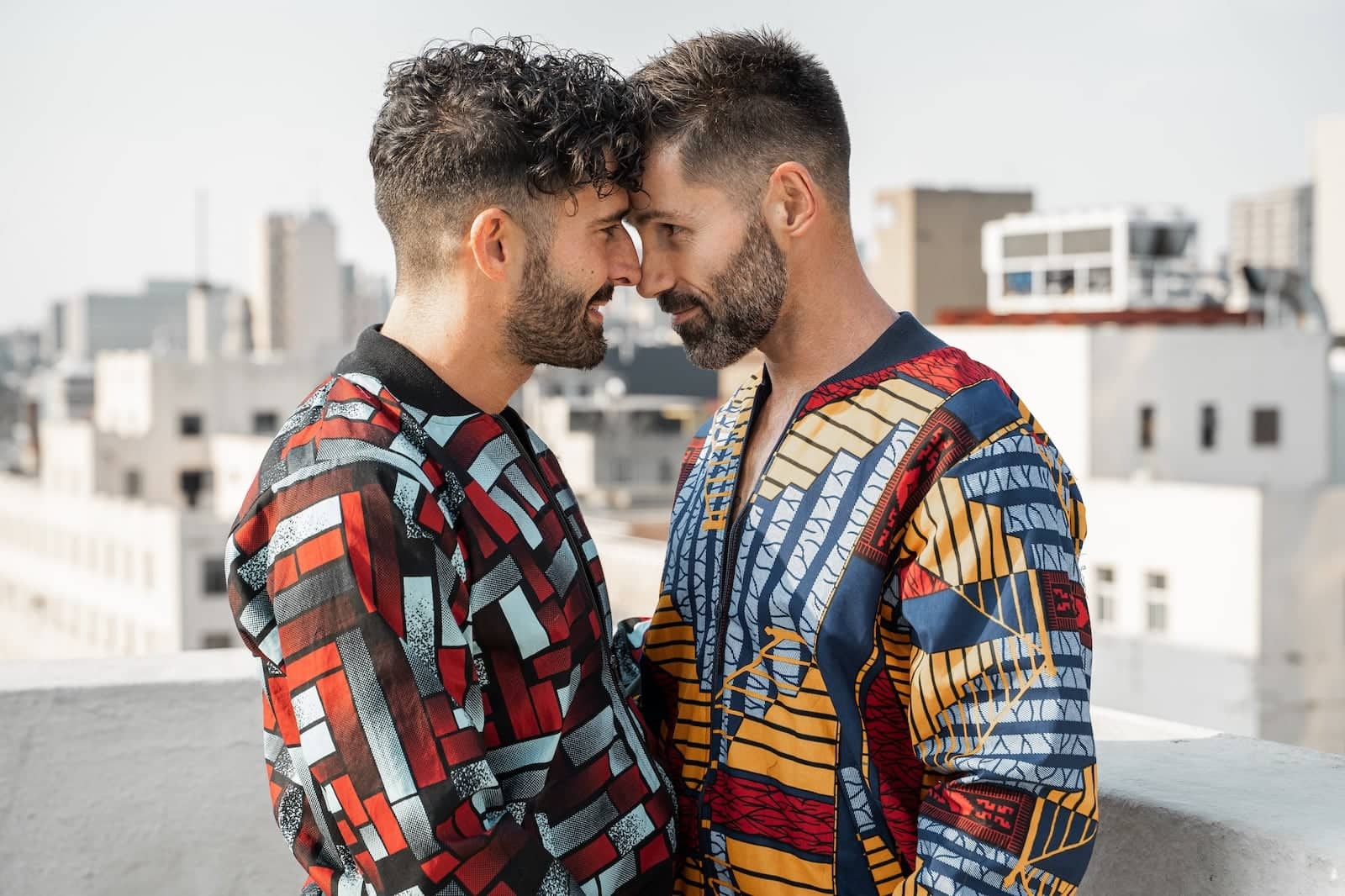 Gay couple modelling the Caraci Clothing African jackets.