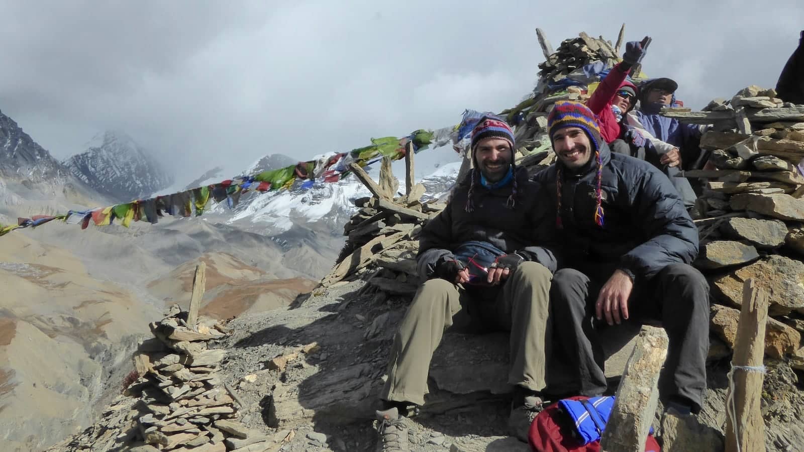 Gay couple resting at High Camp on Annapurna Trek in Nepal.