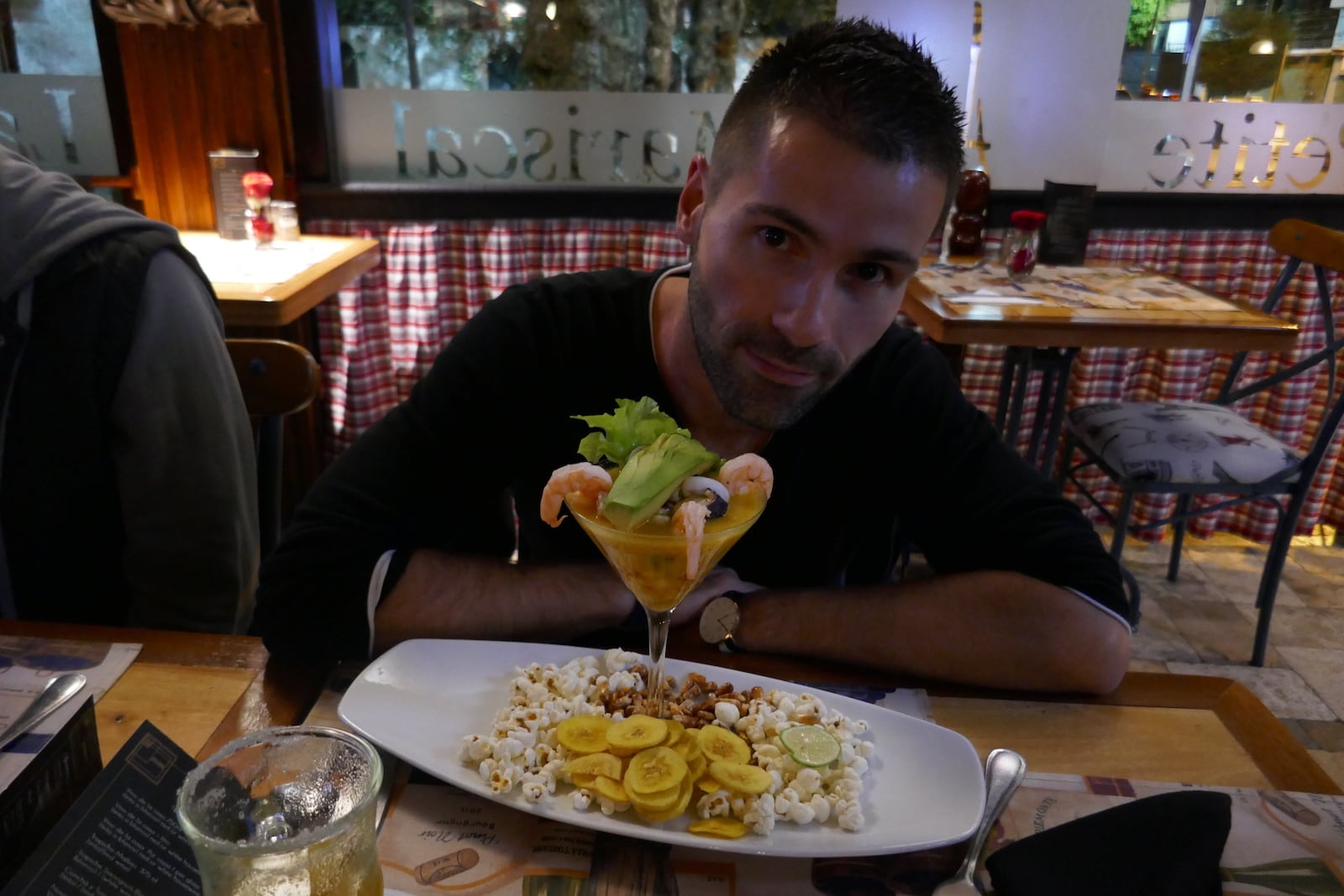 Seby with an Ecuadorian ceviche in Quito.