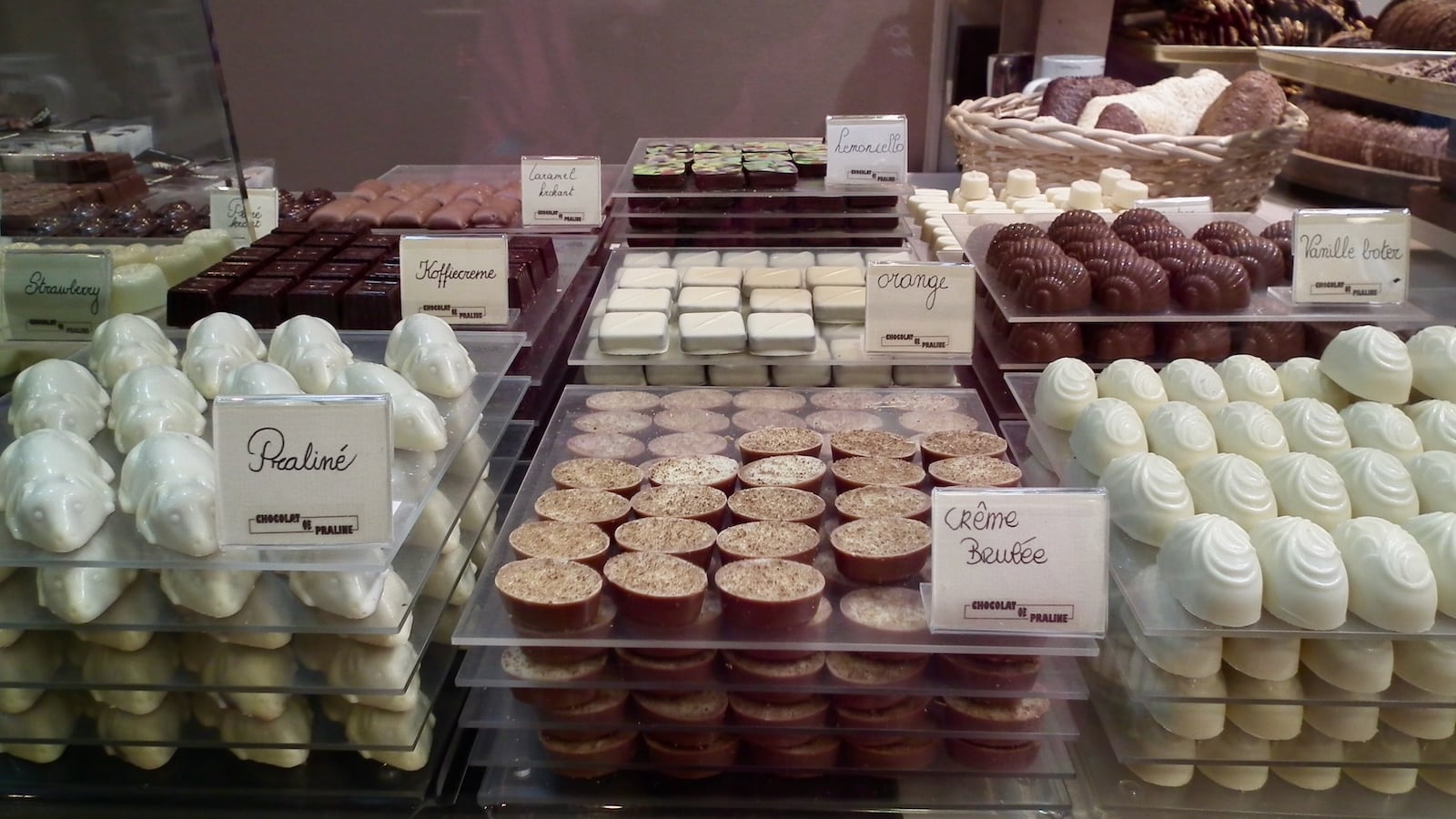 A close up of lots of different chocolates at a Brussels chocolate shop.