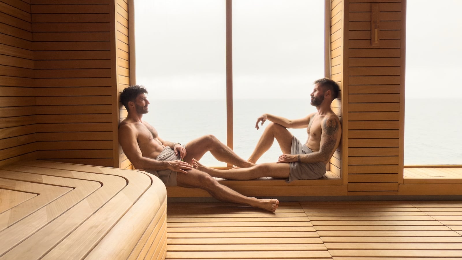 Gay couple in the sauna on the Ultramarine Ship on Antarctica gay cruise.