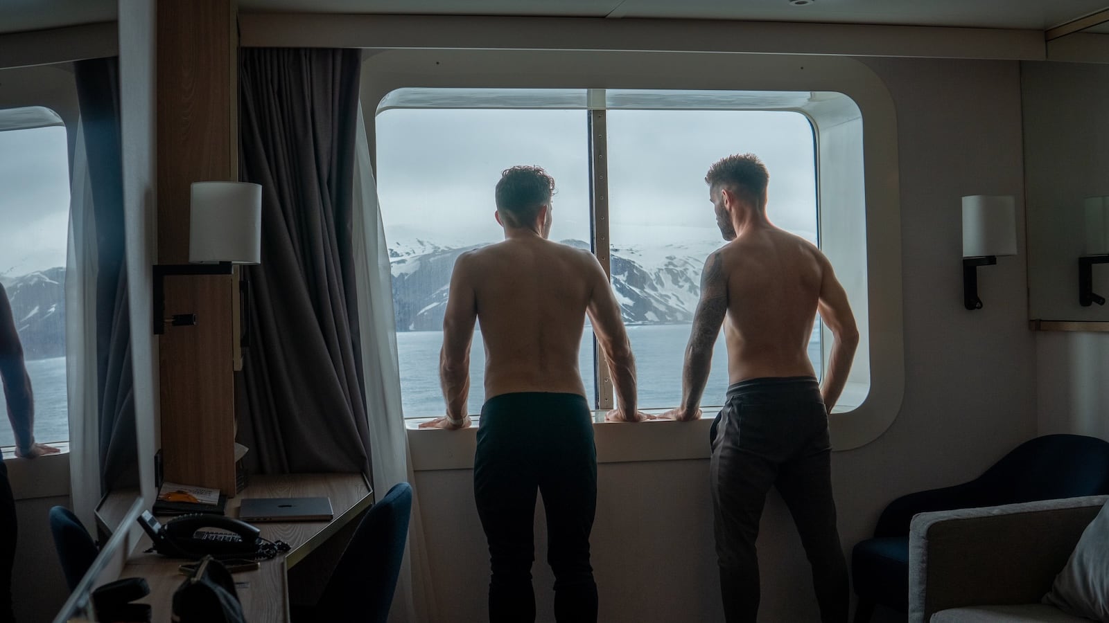 Gay couple topless on gay Antarctica ship.