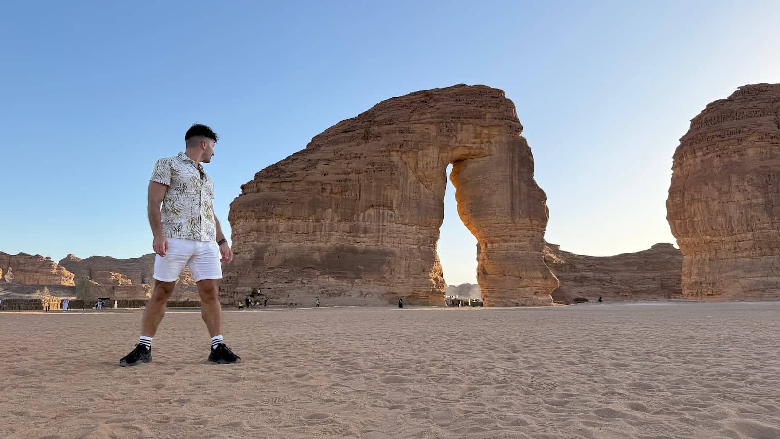 Stefan posing by Elephant Rock in Al Ula, Saudi Arabia.