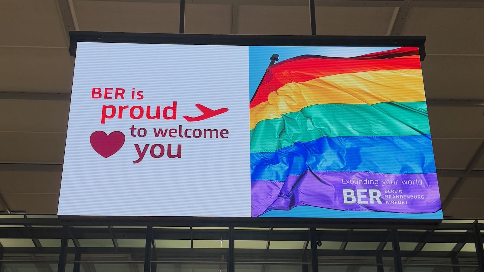 Welcome to Berlin Pride sign at Berlin Airport.