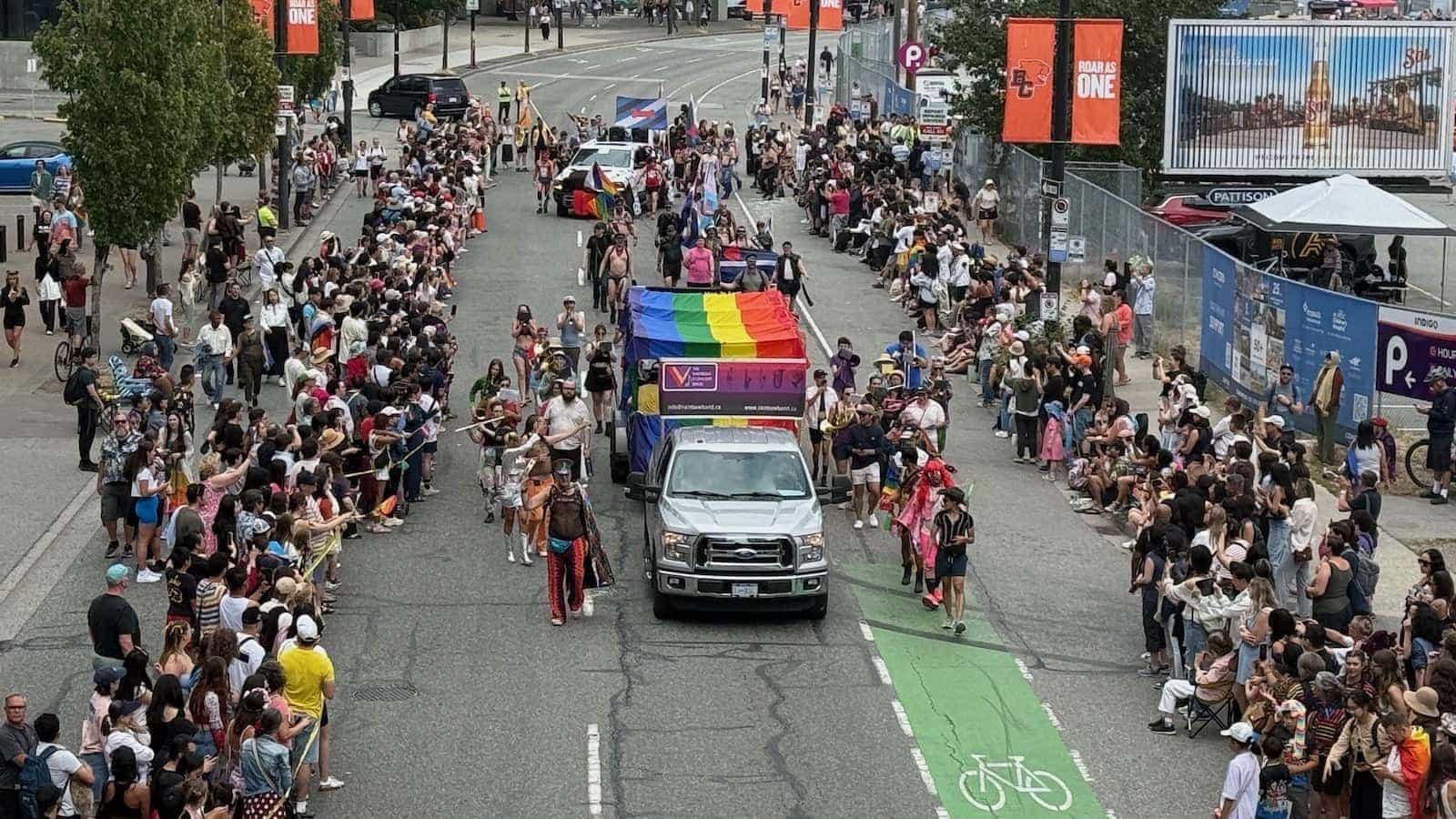 Vancouver Pride Parade crowds lining the streets.