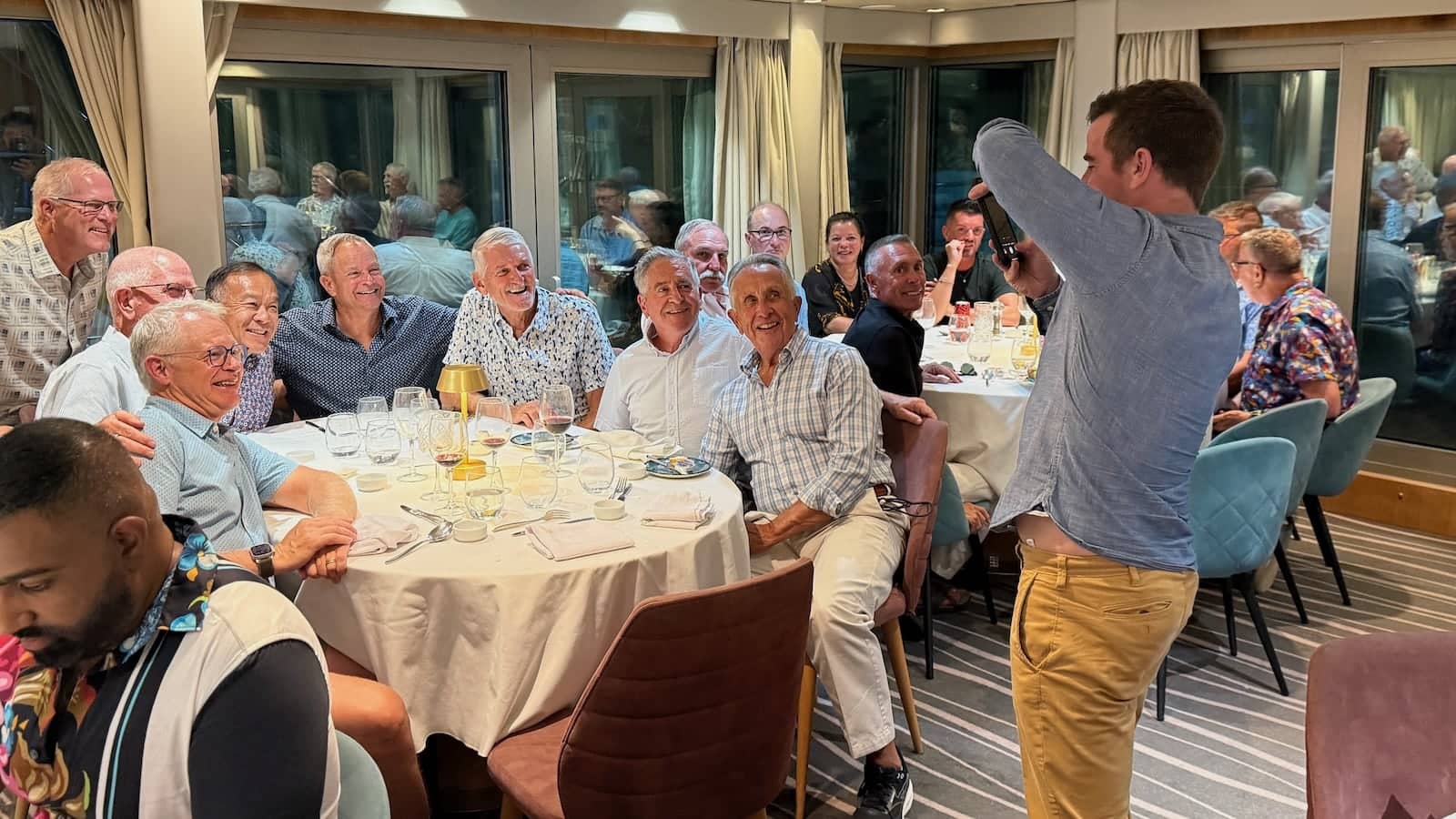 Gay group at dinner on our Greece gay cruise.