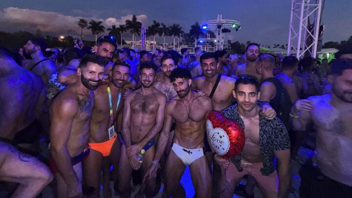 Group of guys at Tropicana pool party at Winter Pride Maspalomas.