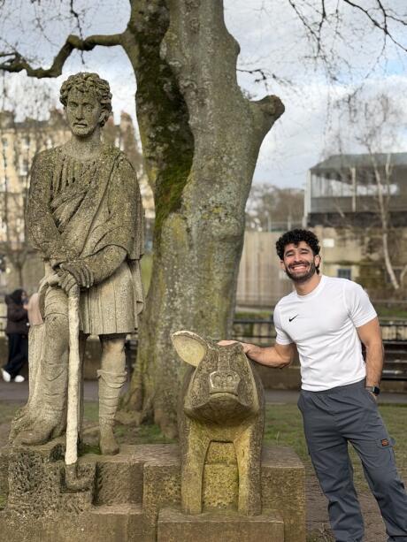 Stefan with statues in the Old Town of Bath.
