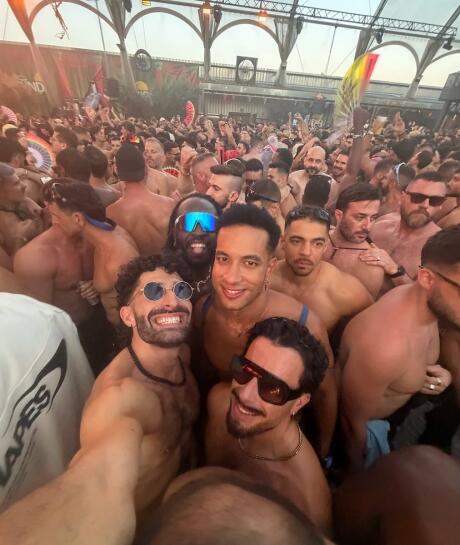 Group of guys at the Sundia gay party at Madrid Pride.