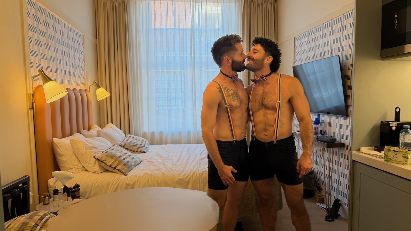 Gay couple at Amsterdam Citadines Canal hotel.